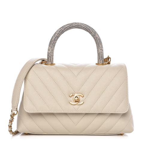 chanel chevron ivory|CHANEL Caviar Lizard Chevron Quilted Mini Coco Handle Flap .